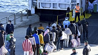 A Covid-szabályok miatt karanténba kerülő migránsok Lampedusán