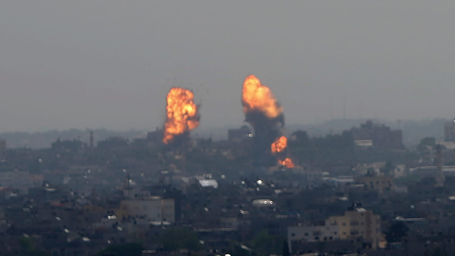 Flares rise after an Israeli forces strike in Gaza City