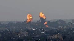 Flares rise after an Israeli forces strike in Gaza City