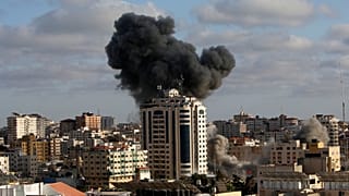 An Israeli air strike hits a building in Gaza City, Monday, May 17