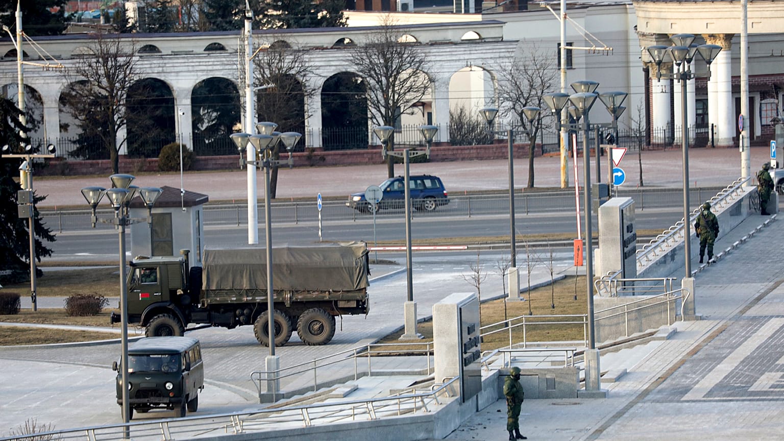 Belarusian interior ministry guard an empty street to prevent a rally in March.