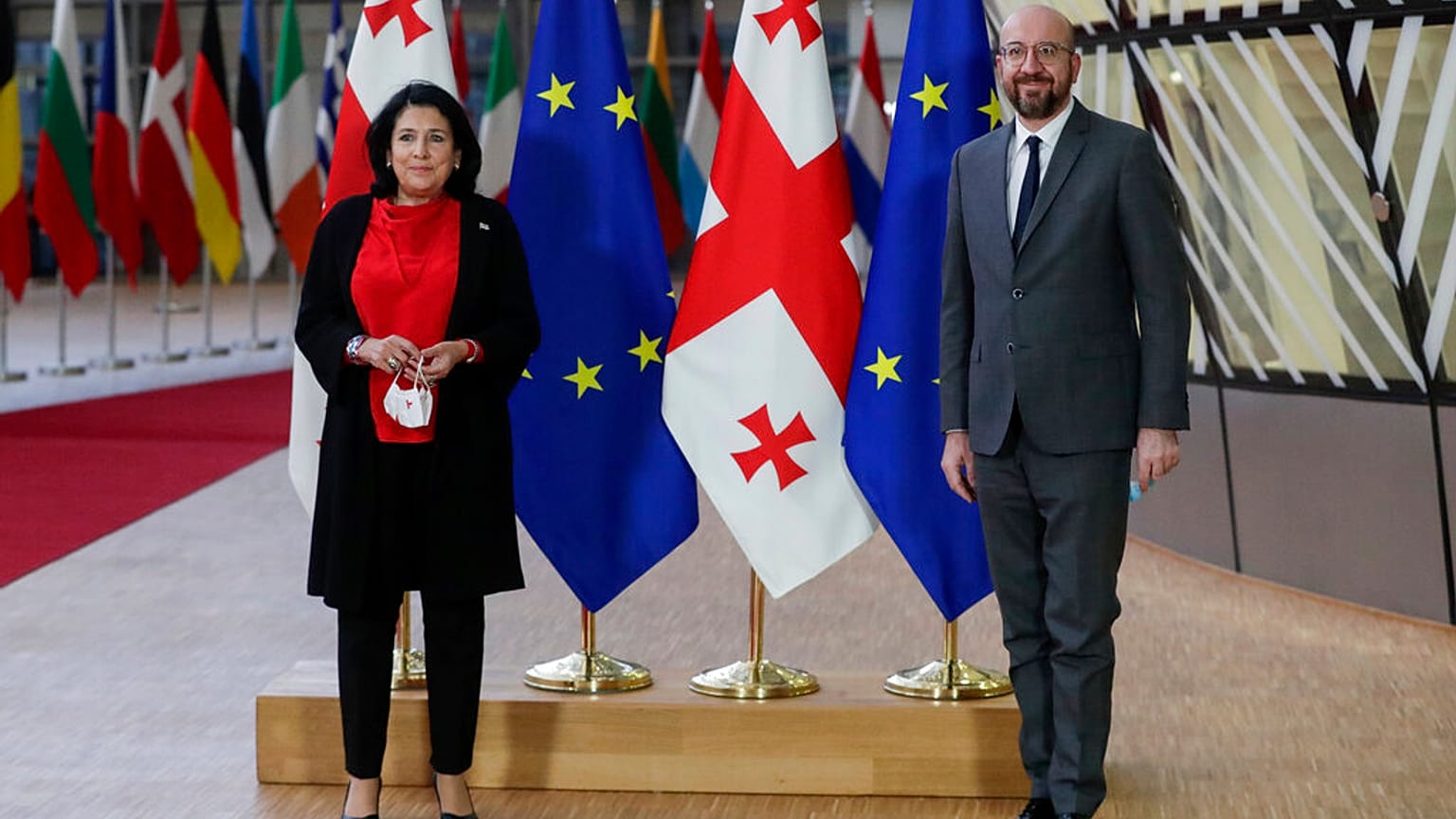 European Council President Charles Michel and Georgia's President Salome Zourabichvili pose for a photograph prior to their meeting at the European Council headquarters
