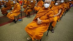 Buddhist monks wait to receive Sinovac COVID-19 vaccines at Priest hospital in Bangkok, Thailand Tuesday, May 18 , 2021.