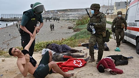 Wave of migrants tries to cross into Ceuta enclave