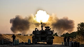 An Israeli artillery unit fires shells towards targets in Gaza Strip, at the Israeli Gaza border, Wednesday, May 19, 2021.
