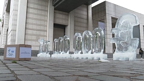  Ice sculptures in front of Bercy against a project to build a Total plant in the Russian Arctic.