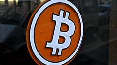  البيتكوين، إحدى العملات المشفرة