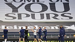 Tottenham Hotspur players at the end of their English Premier League match against Aston Villa at the Tottenham Hotspur Stadium in London, May 19, 2021. 