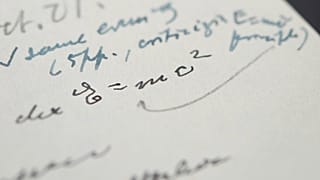 This undated photograph, provided by RR Auction, shows a letter written by Albert Einstein, in which he wrote out his famous "E = mc2" equation.