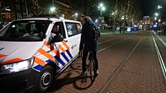 Dutch police  in the center of Amsterdam, Saturday, Jan. 23, 2021.