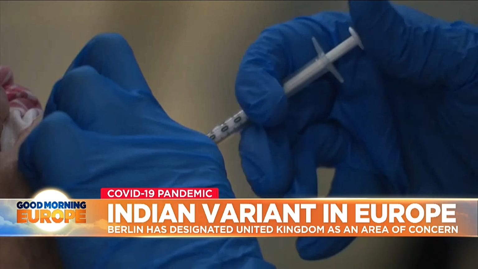 COVID-19 vaccine being given to UK person.