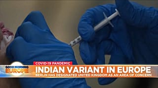 COVID-19 vaccine being given to UK person.