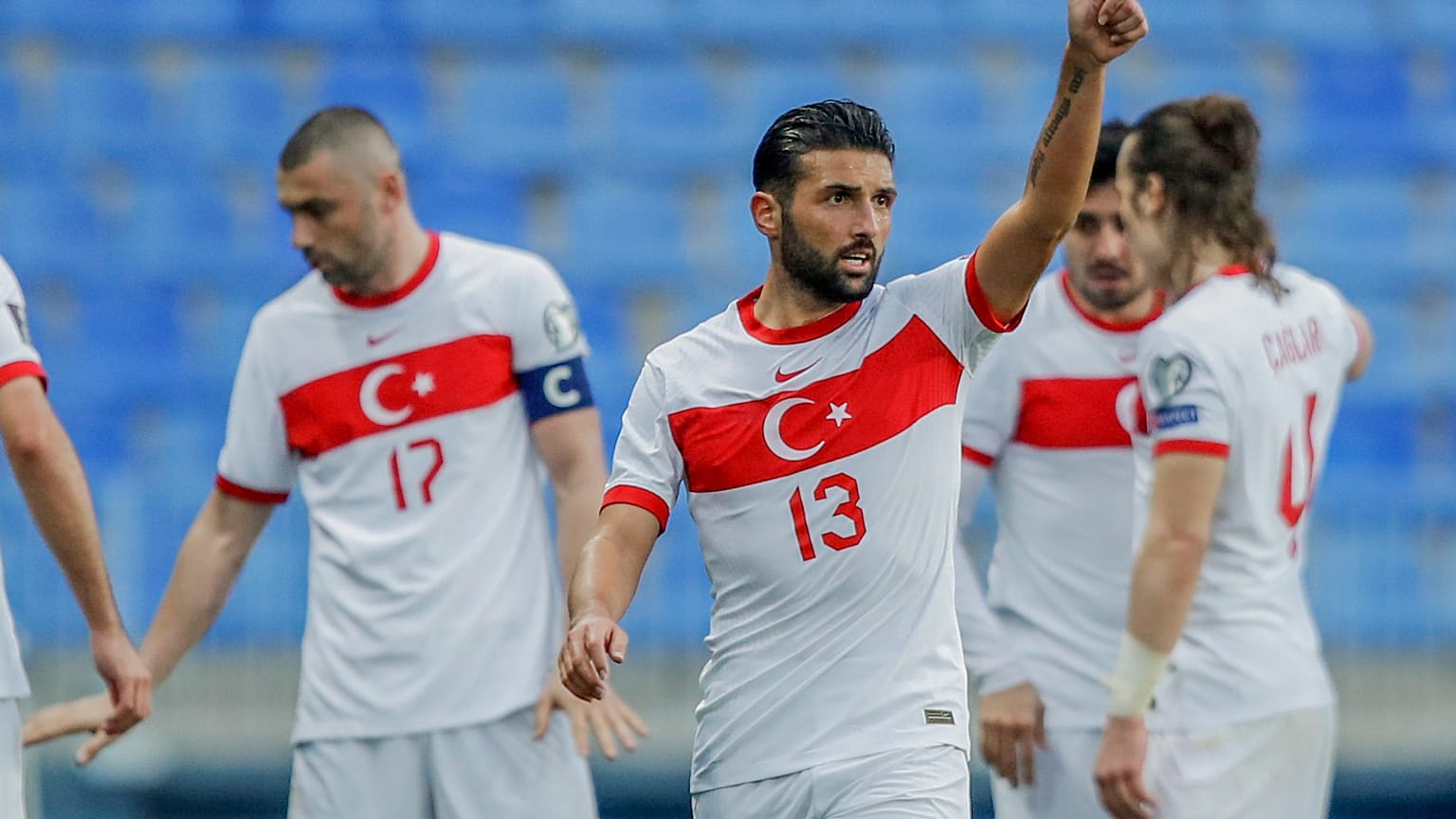 Turkey's Ozan Tufan celebrates during the 2022 FIFA World Cup qualifying match against Norway.