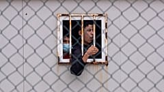 Children who crossed into Spain wait inside a temporary shelter in the enclave of Ceuta, next to the border of Morocco and Spain, Thursday, May 20, 2021.