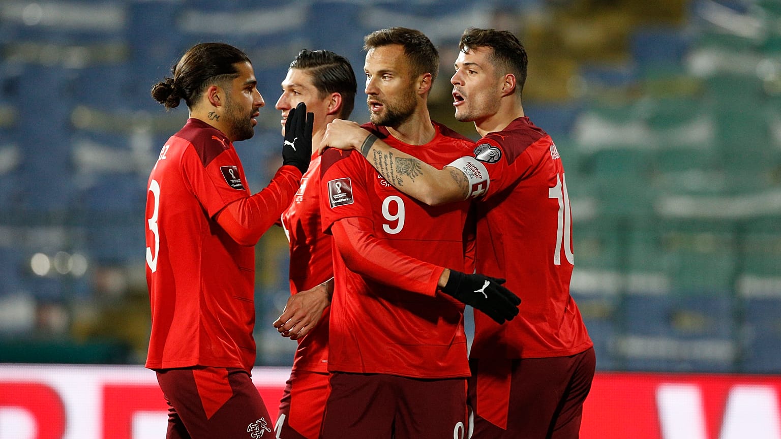 Switzerland celebrates Haris Seferovic's goal during their 2022 FIFA World Cup qualifying match against Bulgaria.