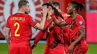 Belgium's players celebrate after scoring during a 2022 FIFA World Cup qualifying match against Belarus.