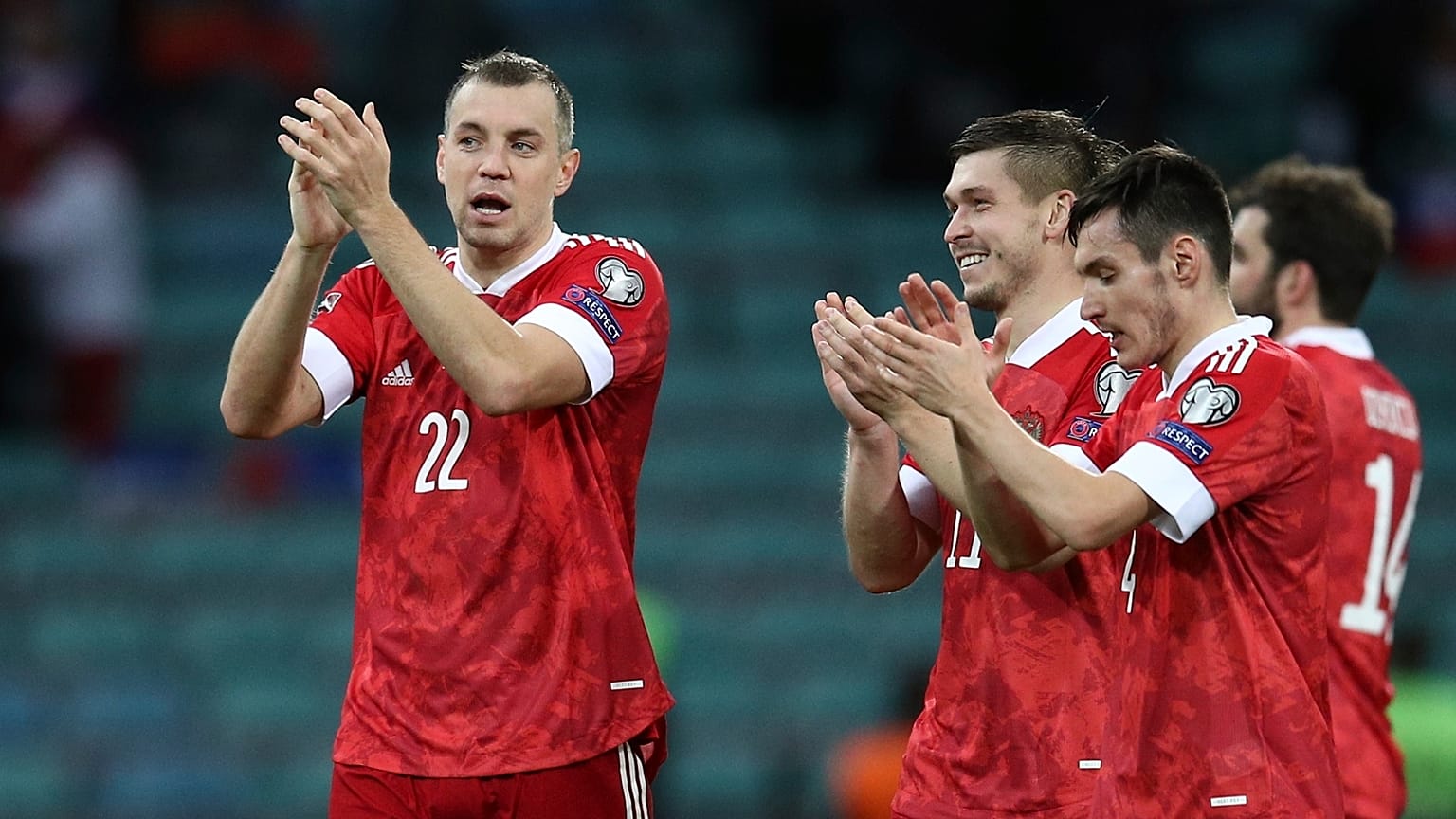 Russia's players celebrate after their FIFA 2022 World Cup qualifying match against Slovenia.