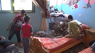 Kids with bare feet trying to clean