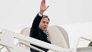 Secretary of State Antony Blinken waves as he departs, Monday, May 24, 2021, at Andrews Air Force Base, Md.