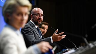 European Council President Charles Michel, center, speaks during a media conference at an EU summit in Brussels, Tuesday, May 25, 2021. 
