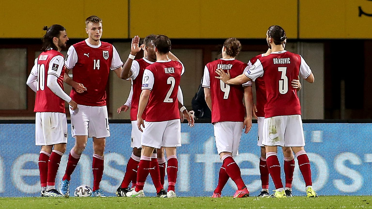Austria's players react during their 2022 FIFA World Cup qualifying match against the Faroe Islands.
