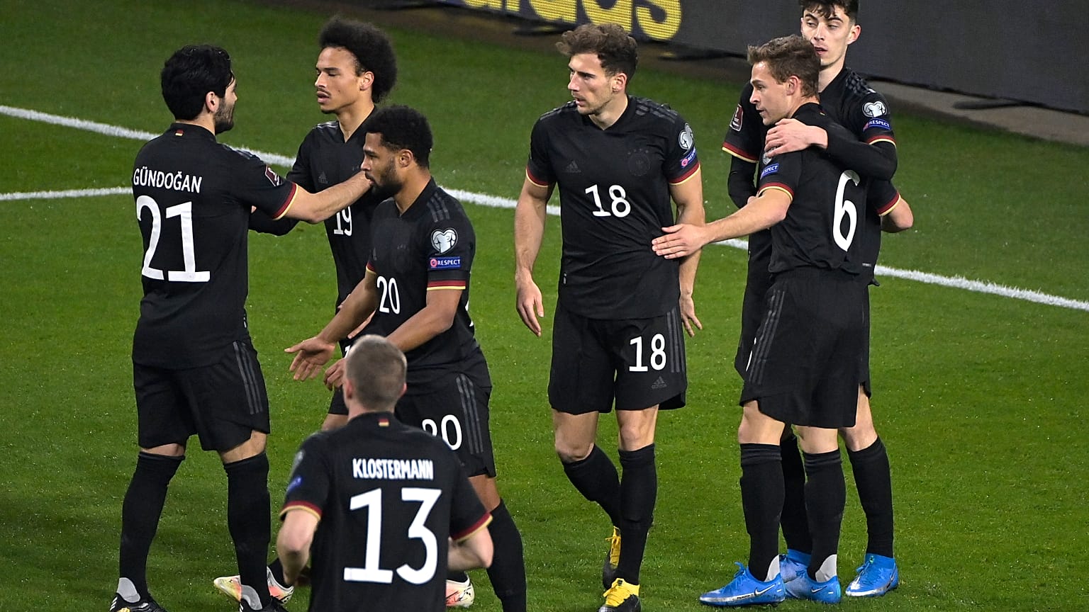 Germany's players celebrate during the 2022 FIFA World Cup qualifying match against Iceland.