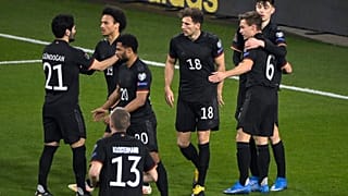 Germany's players celebrate during the 2022 FIFA World Cup qualifying match against Iceland.