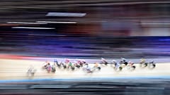 Athletes compete during the women's points races at the Cycling World Championship in Berlin, Germany, March 1, 2020.