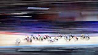 Athletes compete during the women's points races at the Cycling World Championship in Berlin, Germany, March 1, 2020.
