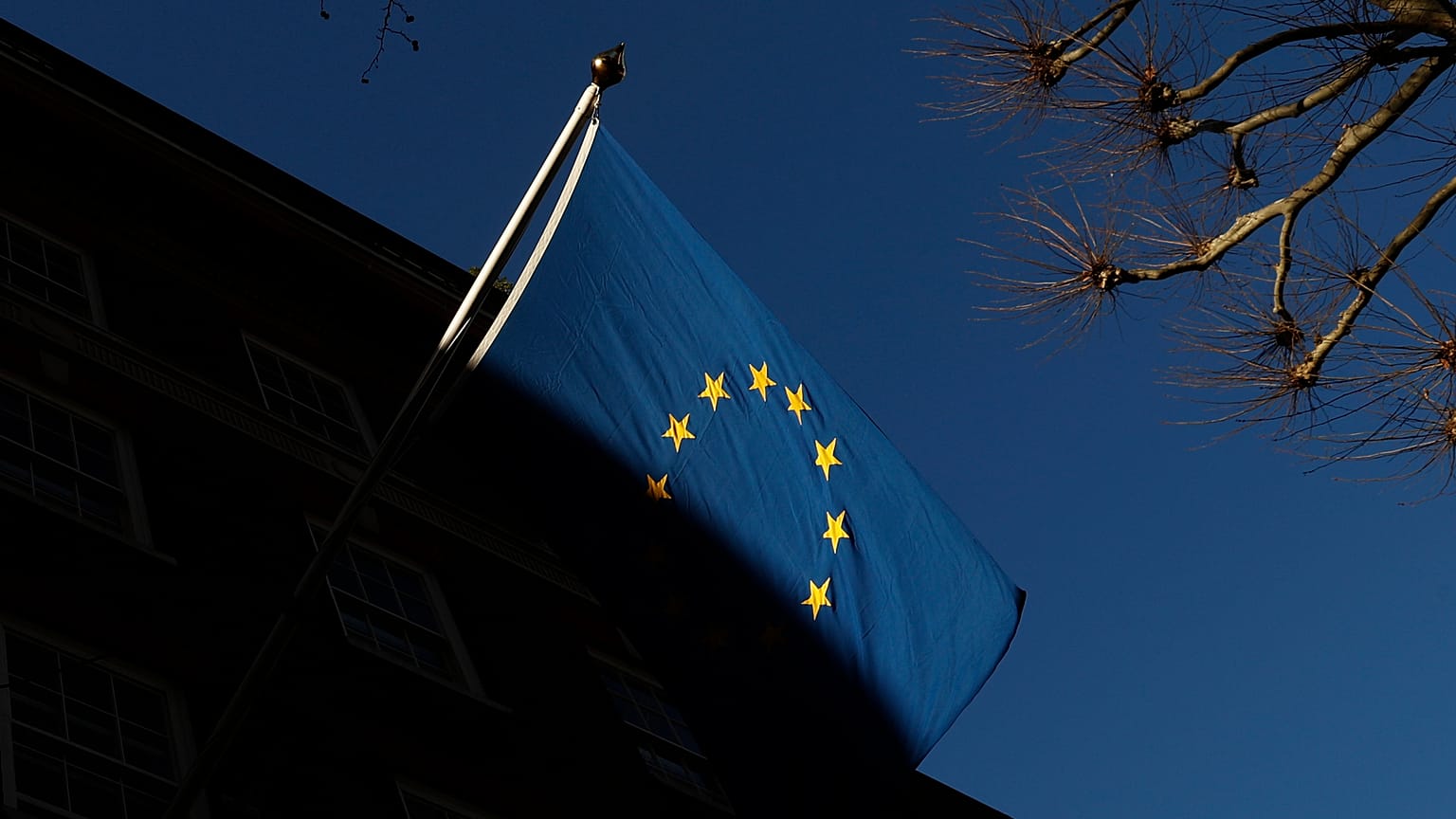 The European Union flag flies outside Europe House in London. 
