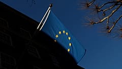The European Union flag flies outside Europe House in London. 