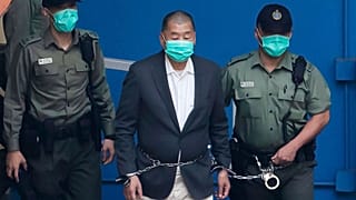 Jimmy Lai is escorted to get on a prison van, Hong Kong