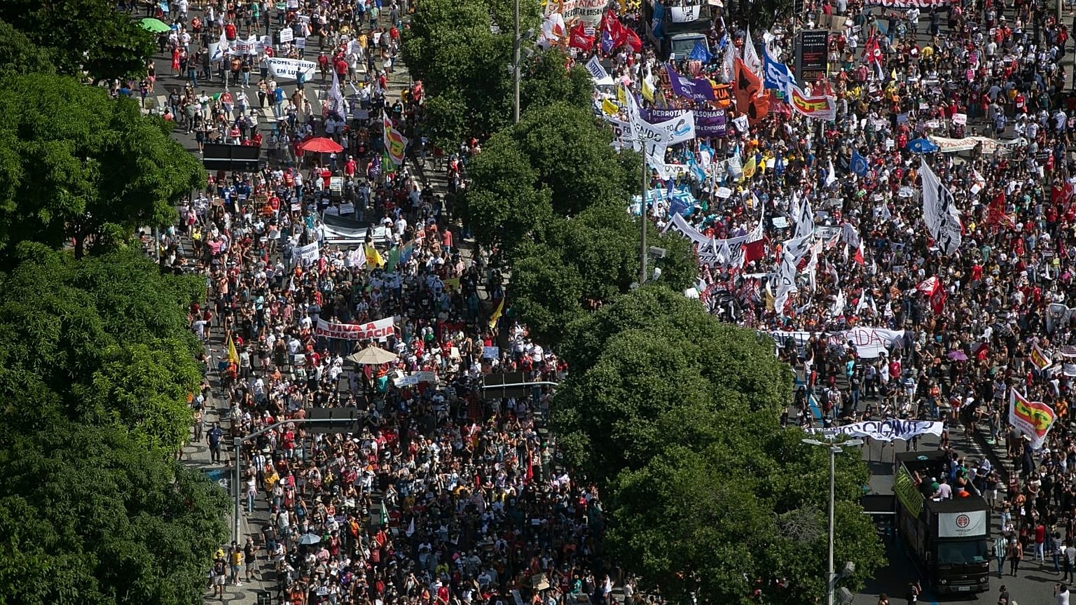 People march in a protest against Bolsonaro's response to COVID-19