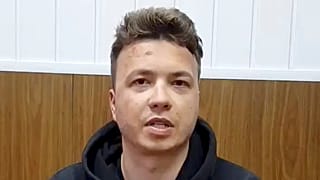 Roman Pratasevich speaks in a video from a detention center in Minsk, Belarus