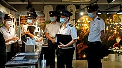 Police question staff at the June 4 Memorial Museum in Hong Kong