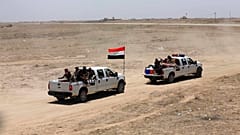 Le Forze di Sicurezza Irachene e le Forze di Mobilitazione Popolare avanzano durante la battaglia contro lo Stato Islamico a Saqlawiyah, vicino a Falluja, in Iraq (02/06/16)
