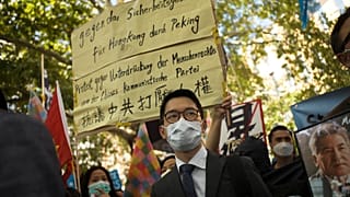 Hong Kong activist Nathan Law, centre, taking part in an anti-Beijing protest in Berlin, Germany.