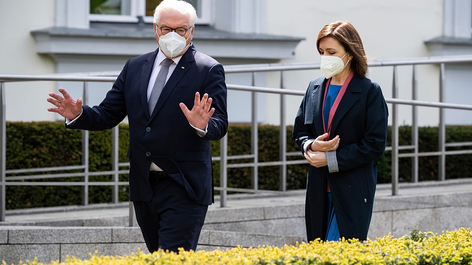 German President Frank-Walter Steinmeier and Maia Sandu, President of the Republic of Moldova, walk in the park of Bellevue Palace before a meeting in Berlin. 