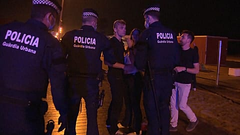  SPAIN police evacuate nearly 5,000 youth