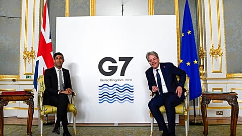 Britain's Chancellor of the Exchequer Rishi Sunak, left, and EU's Economy Commissioner Paolo Gentiloni pose for photos at the G7 summit