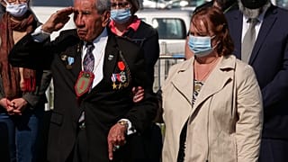 Charles Shay, the 96-year-old native American from Indian Island, Maine, salutes during a D-Day ceremony in Carentan, Normandy, Friday, June 4, 2021. 