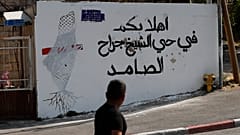 شعار بالعربية "أهلا بكم في حي الشيخ جراح المتعنت" في 25 مايو- أيار 2021، في حي الشيخ جراح بالقدس الشرقية المحتلة الذي ضمته إسرائيل.