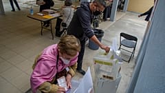 People cast their vote at a polling station, in Mexico City, on June 6, 2021
