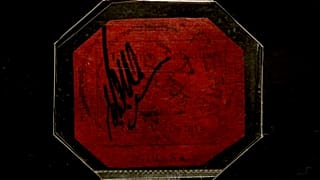 A British Guiana One-Cent Magenta stamp is displayed for photographs at premises of the Sotheby's auction house, in London, Wednesday, April 28, 2021.