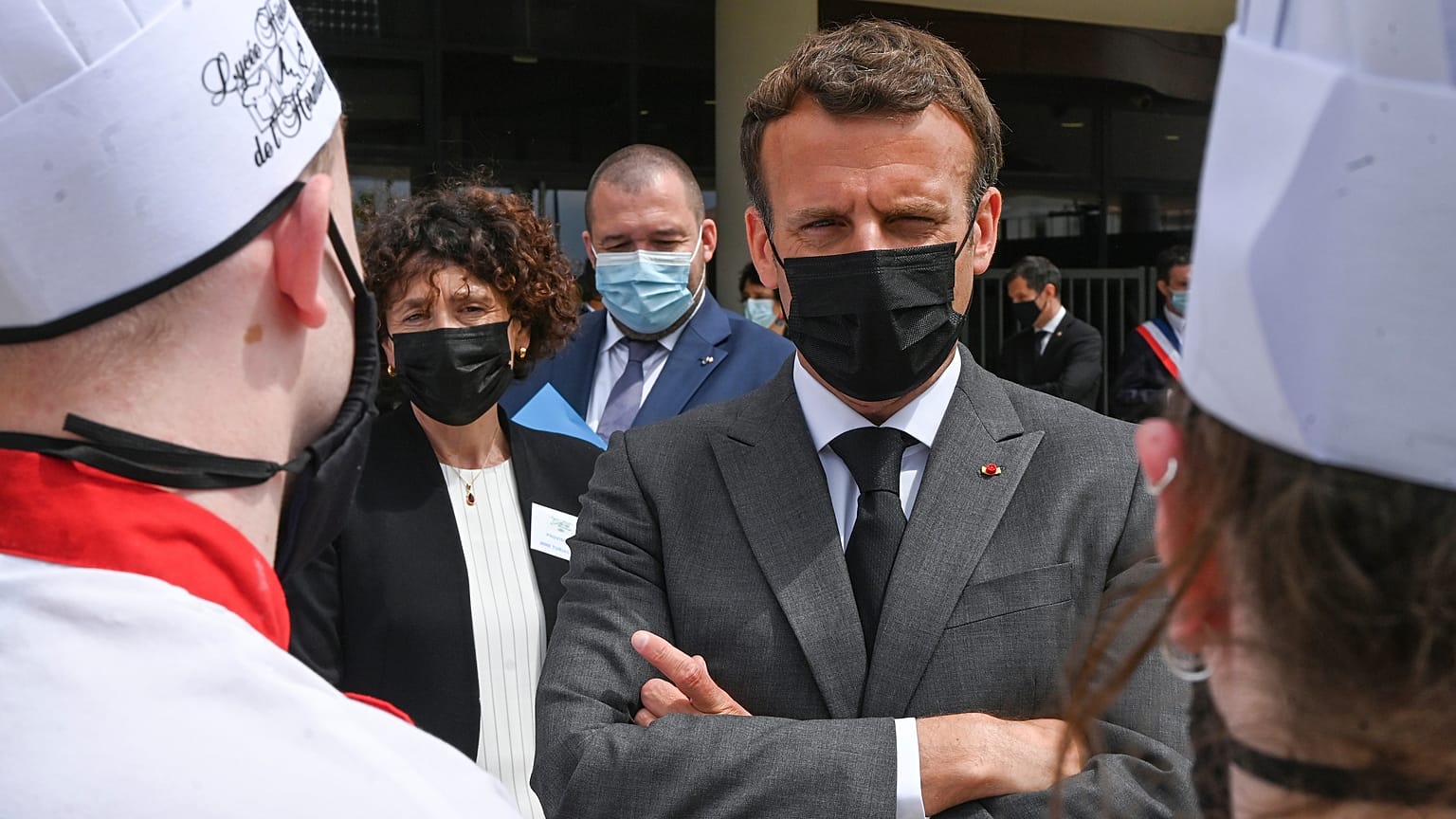 FILE: French President Emmanuel Macron talks with cooking students, Tuesday June 8, 2021 at the Hospitality school in Tain-l'Hermitage, southeastern France.