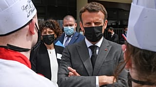 FILE: French President Emmanuel Macron talks with cooking students, Tuesday June 8, 2021 at the Hospitality school in Tain-l'Hermitage, southeastern France.