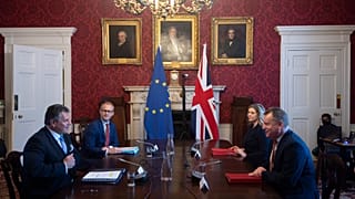 Britain's Minister for the Cabinet Office of the United Kingdom, David Frost, right, speaks to his EU counterpart Maros Sefcovic, during a meeting, in London, June 9, 2021. 