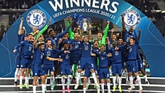 Chelsea's team captain Cesar Azpilicueta lifts the trophy at the end of the Champions League final match between Manchester City and Chelsea,  in Porto, Portugal, May 29, 2021