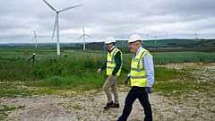 Boris Johnson visits Scottish Power Carland Cross Windfarm to view new construction on a solar farm in Newquay, Cornwall, England