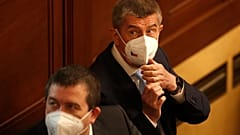 Czech Republic's Prime Minister Andrej Babis adjusts his face mask during a parliament session in Prague, Czech Republic, Thursday, June 3, 2021. 